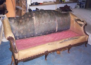 Check out this antique camel back sofa before it reached the skilled craftsmen at H&A Upholstery